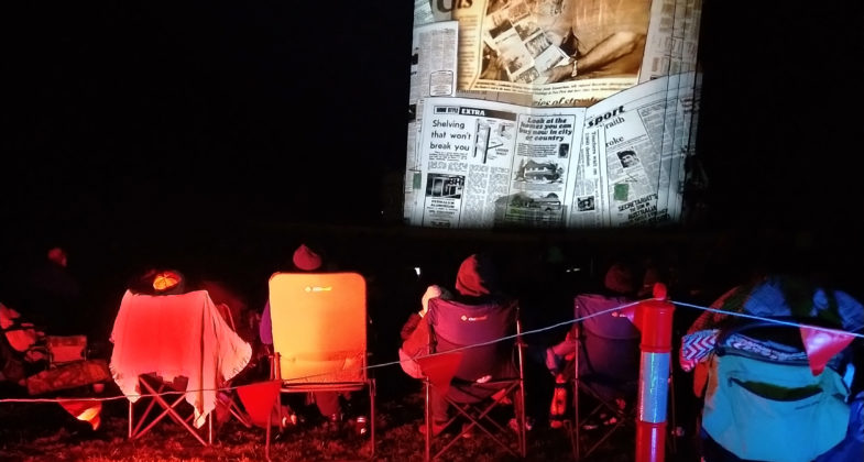 Iconic photo of audience watching Booleroo Silo with projection