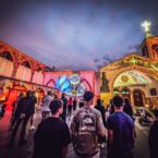 Projection-mapped imagery from the 2025 show, exploring themes of spirituality, peace, and cultural harmony through light.