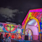 Projection-mapped imagery from the 2025 show, exploring themes of spirituality, peace, and cultural harmony through light.